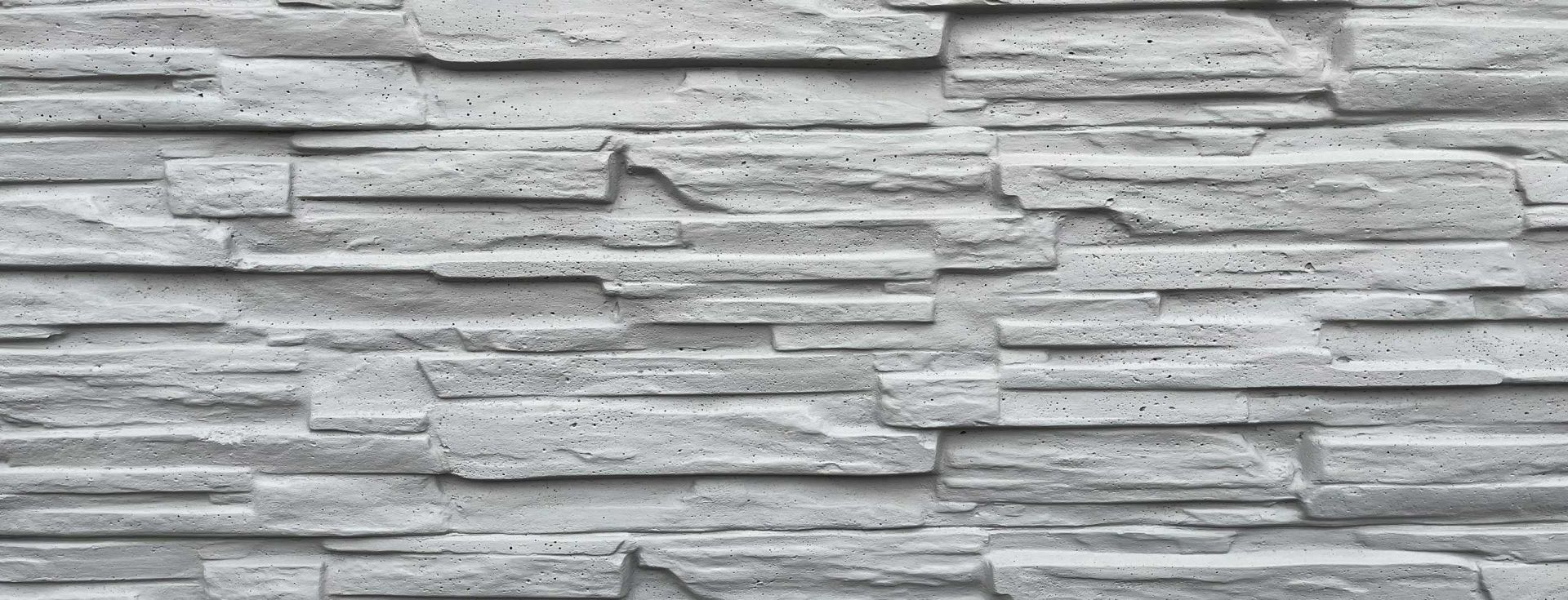 Zaunteam | Betonzaun in Bruchstein Optik